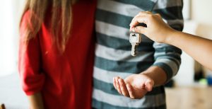 A landlord passing on the keys to his buy to let property that he was able to secure by getting 2 mortgages