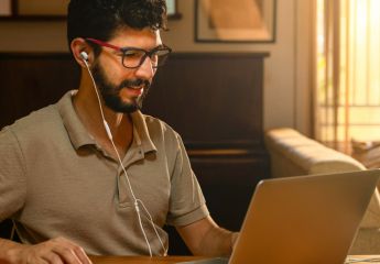 A buy to let landlord on his laptop looking for properties to invest in