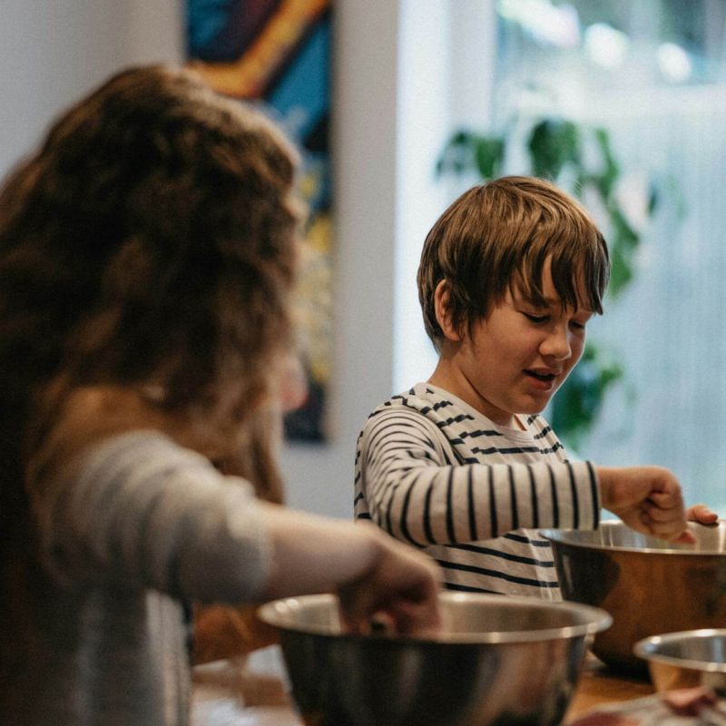 Two children cooking the kitchen